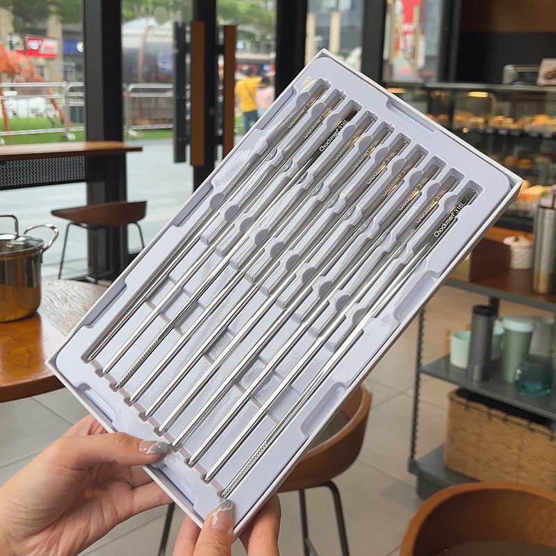 Chockmen Zhuo Deming Jingying serie 316L de acero inoxidable antideslizante palillos del hogar caja de regalo 10 pares