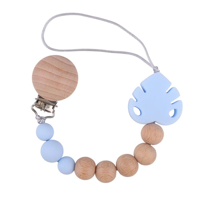 Suministros para bebés creativo haya chupete clip molar juguete mordedor bebé hoja de silicona chupete cadena anti-caída de la cadena