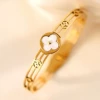 Hollow mugwort leaf clover white shell golden color