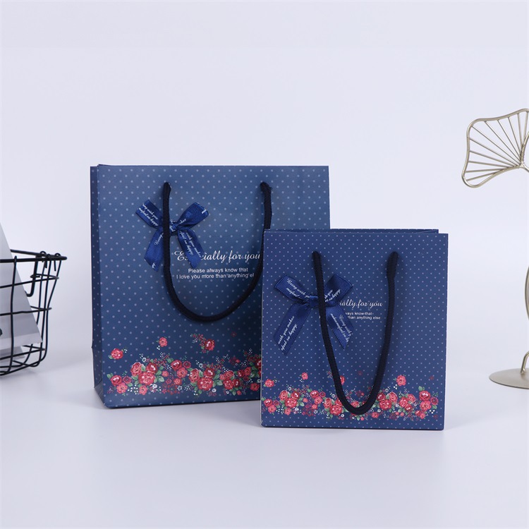 彩色印花手提礼品袋 加厚白卡纸手提袋 服装店包装购物袋加印logo