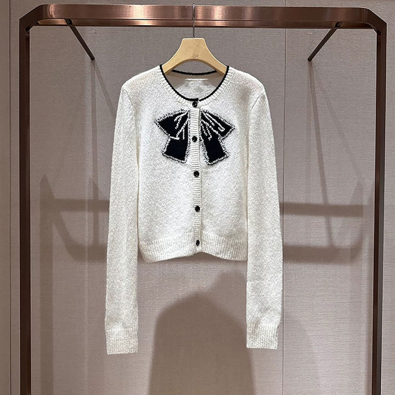 Mo Shuweiya 2026 Autumn New Round Neck Long Sleeve Bow Single-Breasted Knit Sweater XSJ4M24D