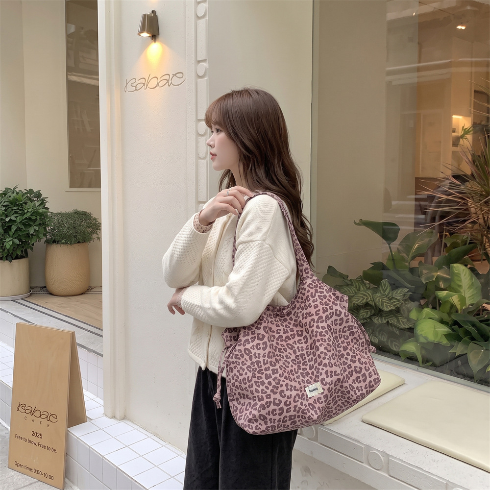 68255 Korean-style sweet and cool leopard print drawstring tote bag, casual style, large capacity, new canvas shoulder tote bag