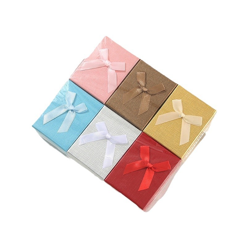 Moderno sistema minimalista de arco de color sólido caja pequeña caja de regalo de vacaciones caja de joyería hermosa caja de color mezcla al por mayor