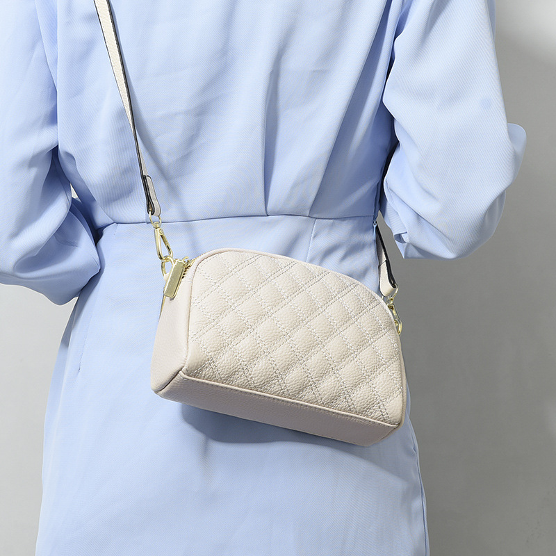 2023 Verano nueva moda crossbody de piel de vaca del todo fósforo Bolso pequeño Bolso transfronterizo del teléfono móvil del cuero genuino bolso de hombro del rombo de las mujeres