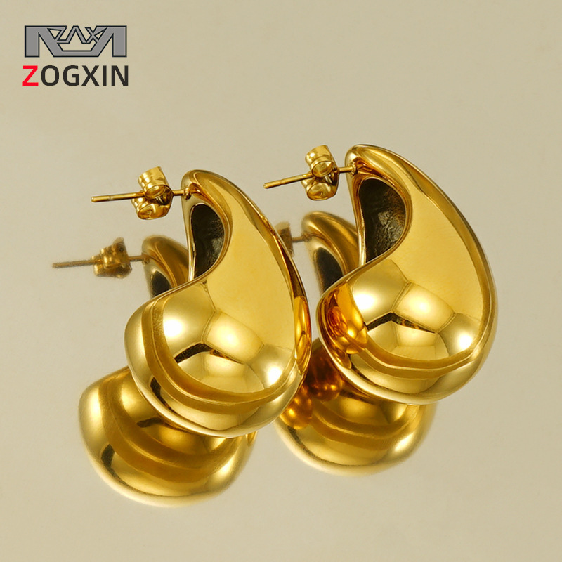 Diseño de alta gama sentido 18K oro gordito gota de agua pendientes de acero de titanio INS moda femenina todo partido pendientes geométricos al por mayor