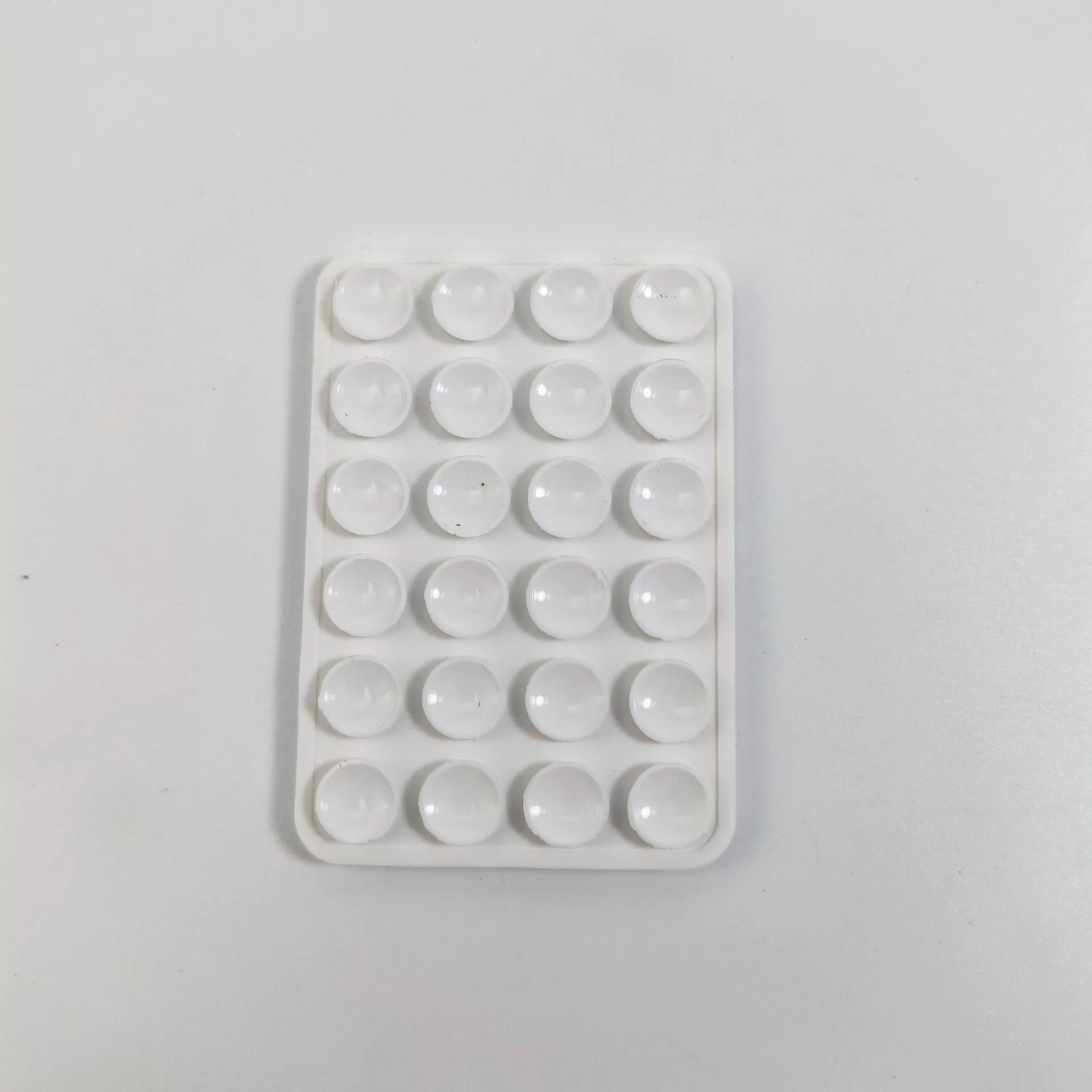 Double-sided silicone suction pads, food-grade, 24- and 40-capsule sizes, ~10 g each