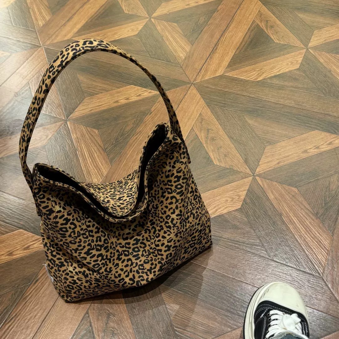 Bolso con estampado de leopardo para mujer de gran capacidad 2025 nuevo otoño e invierno bolso de compras de un solo hombro de lona salvaje