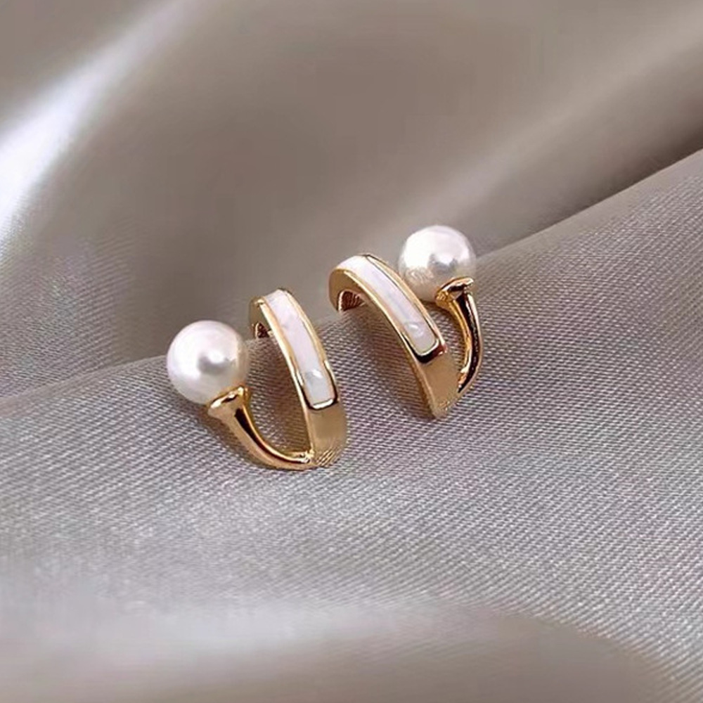 Aguja de plata de moda alta sensación de diamante de goteo de aceite pendientes nicho universal elegante pernos de orejas ligero lujoso temperamento simple orejas para mujeres