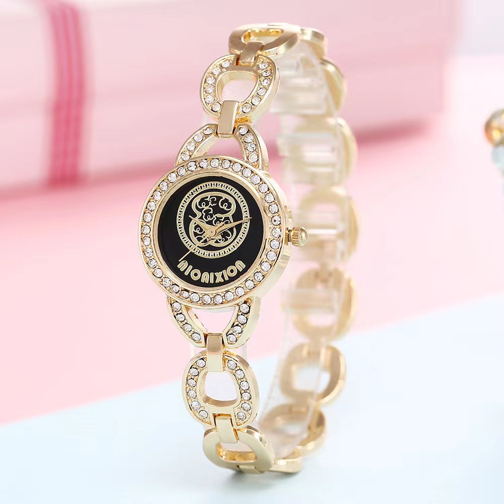 Selezionato orologio da polso versatile in oro di vendita caldo per donna con intarsio di diamanti Orologio da polso squisito di marca Orologio da studentessa con orsetto carino_voghion.com