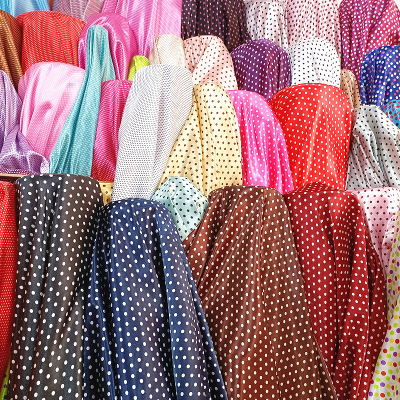 圆点色丁印花面料 服装里布布料 丝绸波点头饰飘带箱包被套家居服