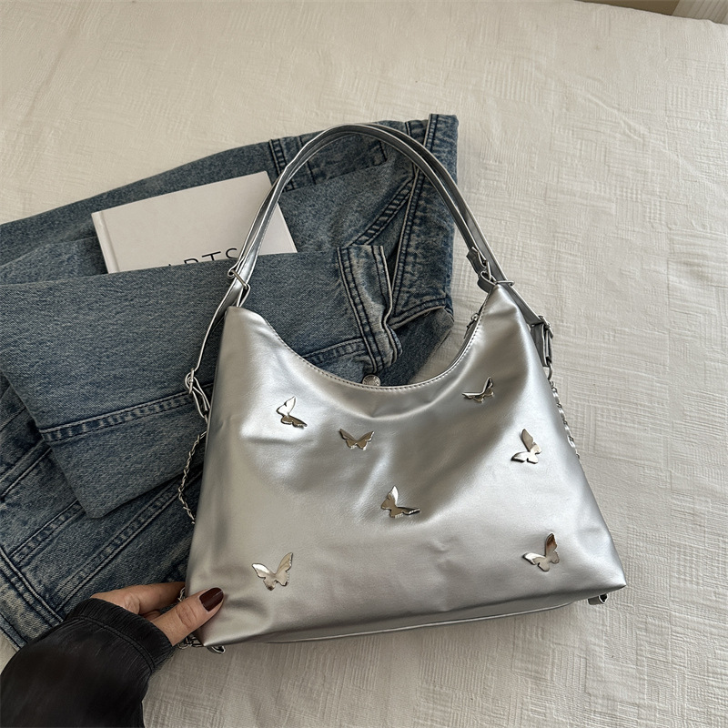 Bolso de cadena de moda popular para mujeres 2024 verano nuevo bolso de hombro de gran capacidad nicho mariposa mochila de trabajo