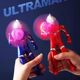 Ultraman handheld fan luminous hand pressure superman summer portable small manual fan children's toy gift