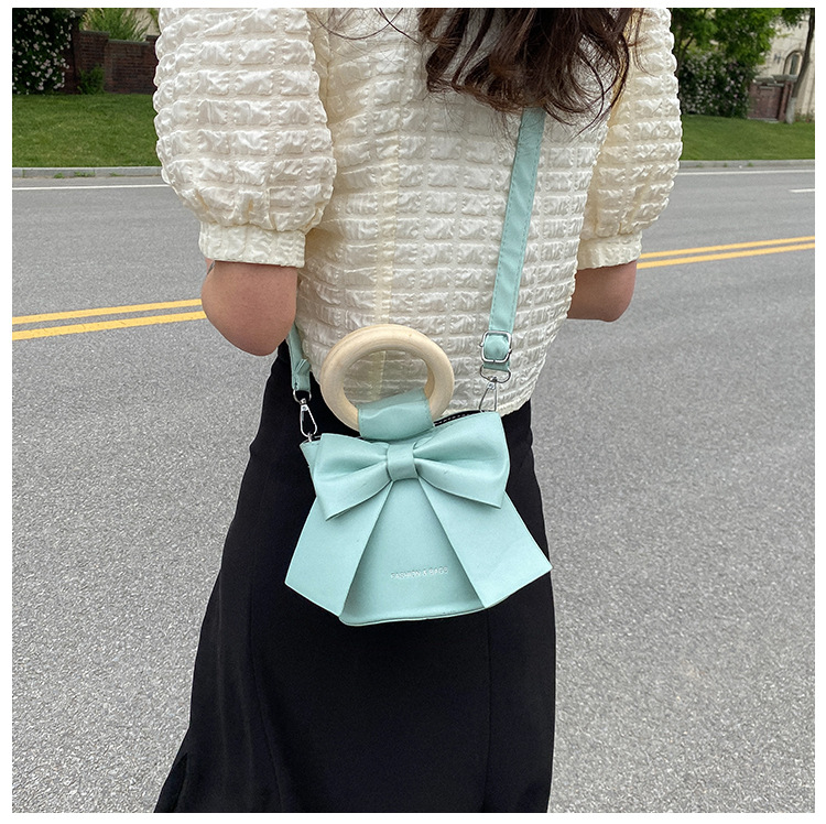 455g Weight Synthetic Leather Lining Material Sewing Thread Fashion Element Magnetic Buckle Closure Type Single Shoulder Strap, Double Handle Strap Type Bucket Bag Bags Type Casual Occasion Pu Leather Material Bow Knot Pattern All Seasons Season Women's Gender Elegant Style Bucket Shape Small Size Women's Small Pu Leather Bow Knot Elegant Sewing Thread Bucket Magnetic Buckle Bucket Bag 36