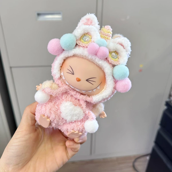 Purely handmade gentle pink New Year lion awakening