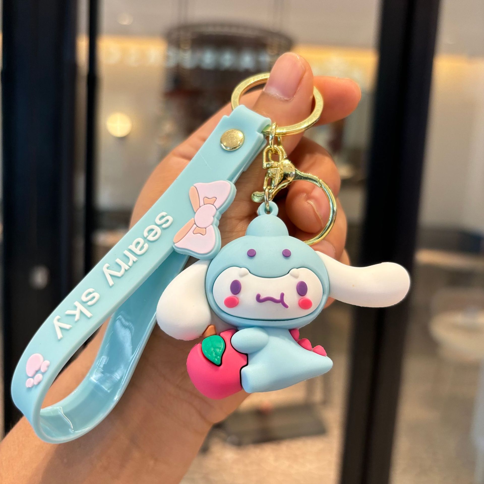 Caricatura Sanrio llavero colgante de muñeca Kulomi bolso de coche llavero muñeca máquina pequeña regalo al por mayor