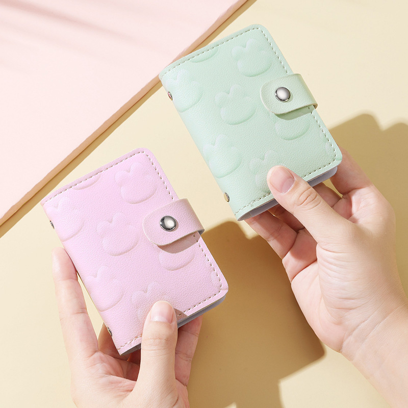 Coreano multifuncional pequeño dibujo animado fresco en relieve conejo 20 tarjeta anti-damagnetizante hebilla vertical bolsa de tarjetas