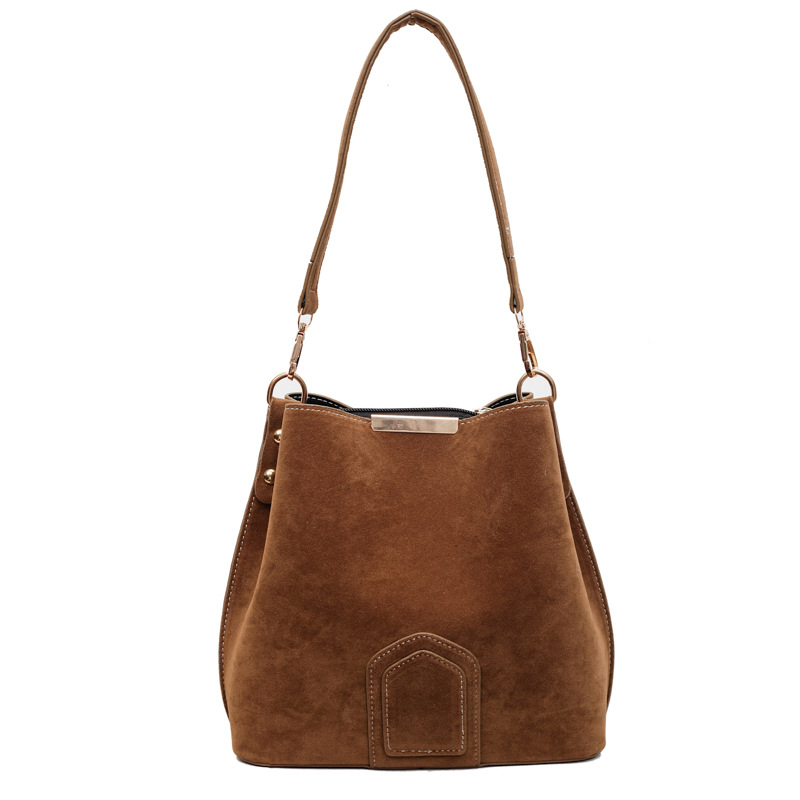 Bolsa de textura de alta calidad para mujeres 2025, otoño y invierno, nuevo bolso de cubo retro, moda extranjera, mochila de viaje universal.