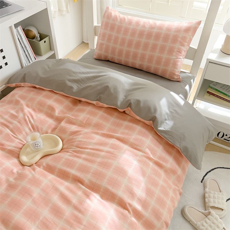 Dormitorio traje de cama de algodón de tres piezas 2025 nuevo estudiante universitario individual juego completo de sábanas de edredón de algodón para todas las estaciones