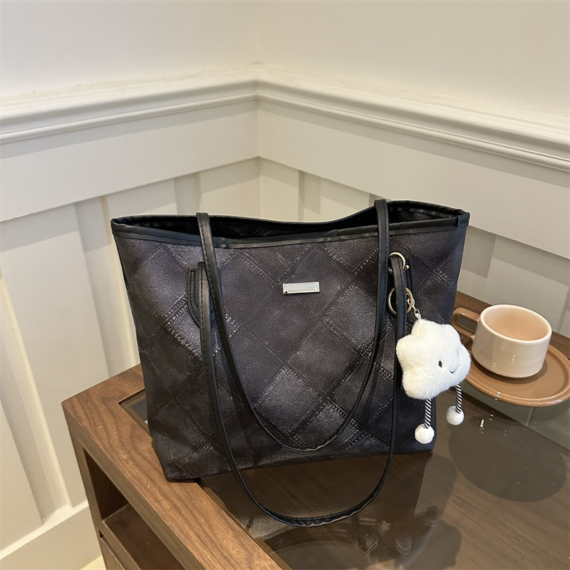 Casual retro bolso de gran capacidad para mujeres 2024 nueva moda moda bolso de hombro de tendencia de textura universal bolso de viaje