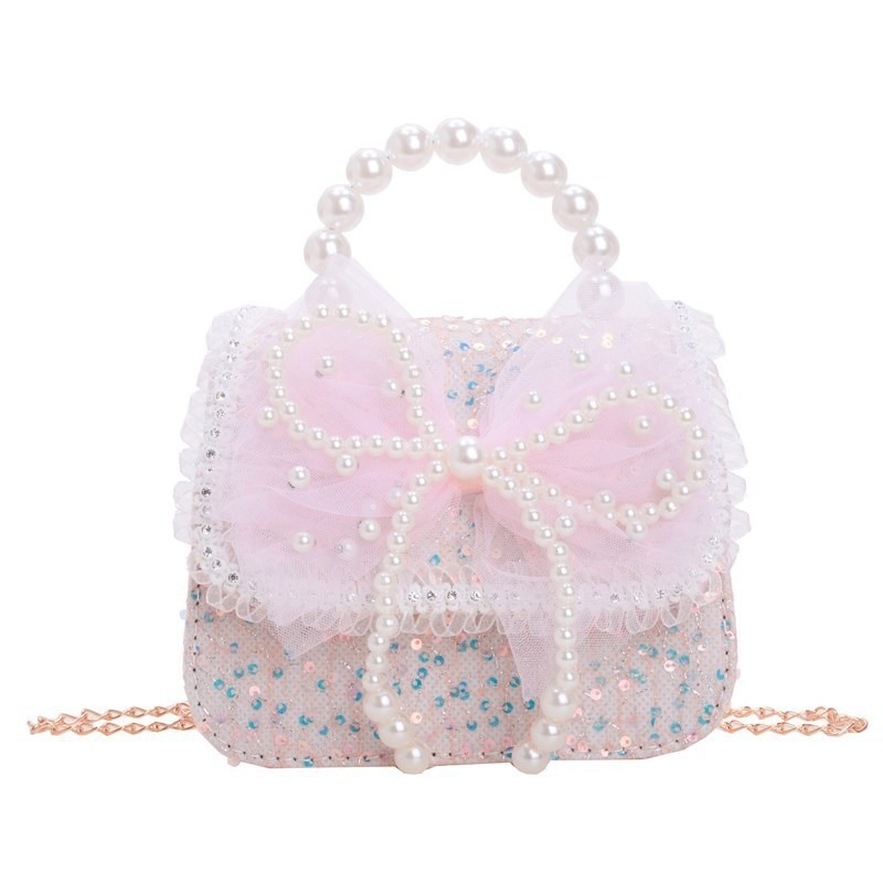 Accesorios para niños bolsos de moda de verano bolsos de mochila para chicas bolsos de mano princesa de perlas bolsos de cambio de viento fragante