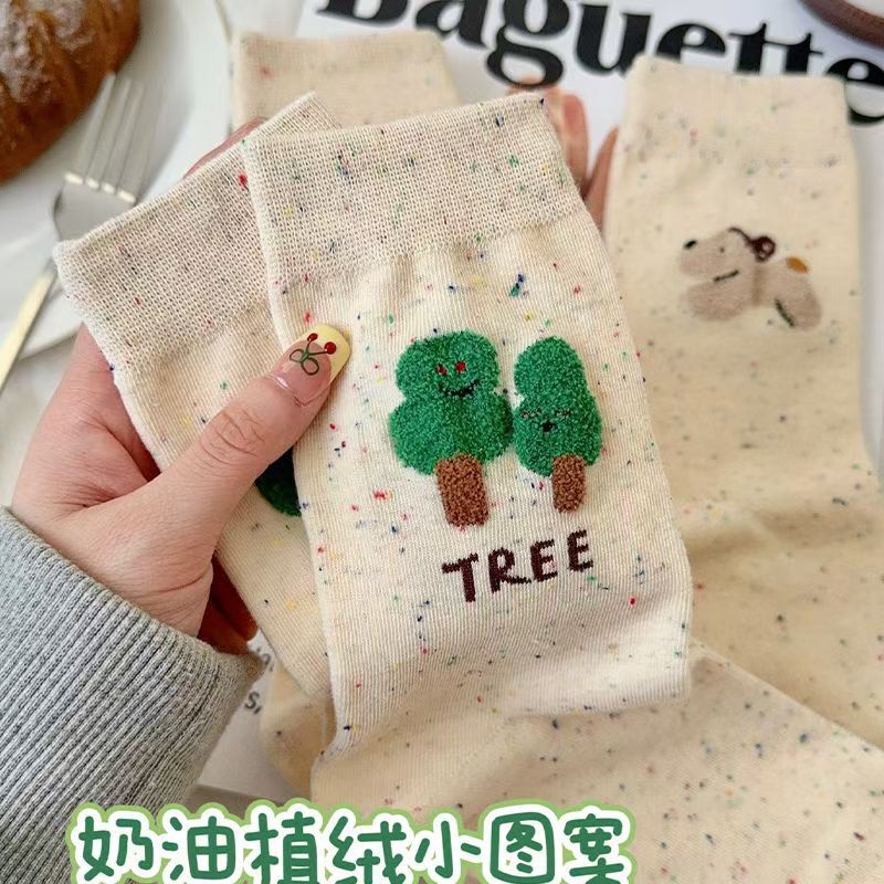 Flocado japonés linda chica hilo de puntadas dibujos animados otoño e invierno calcetines al por mayor Zhuji calcetines de mujer marea callejera