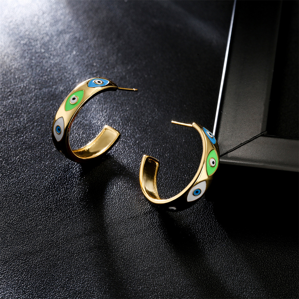 Europe And America New Copper-plated Real Gold Oil Dripping Devil’s Eye Earrings display picture 7