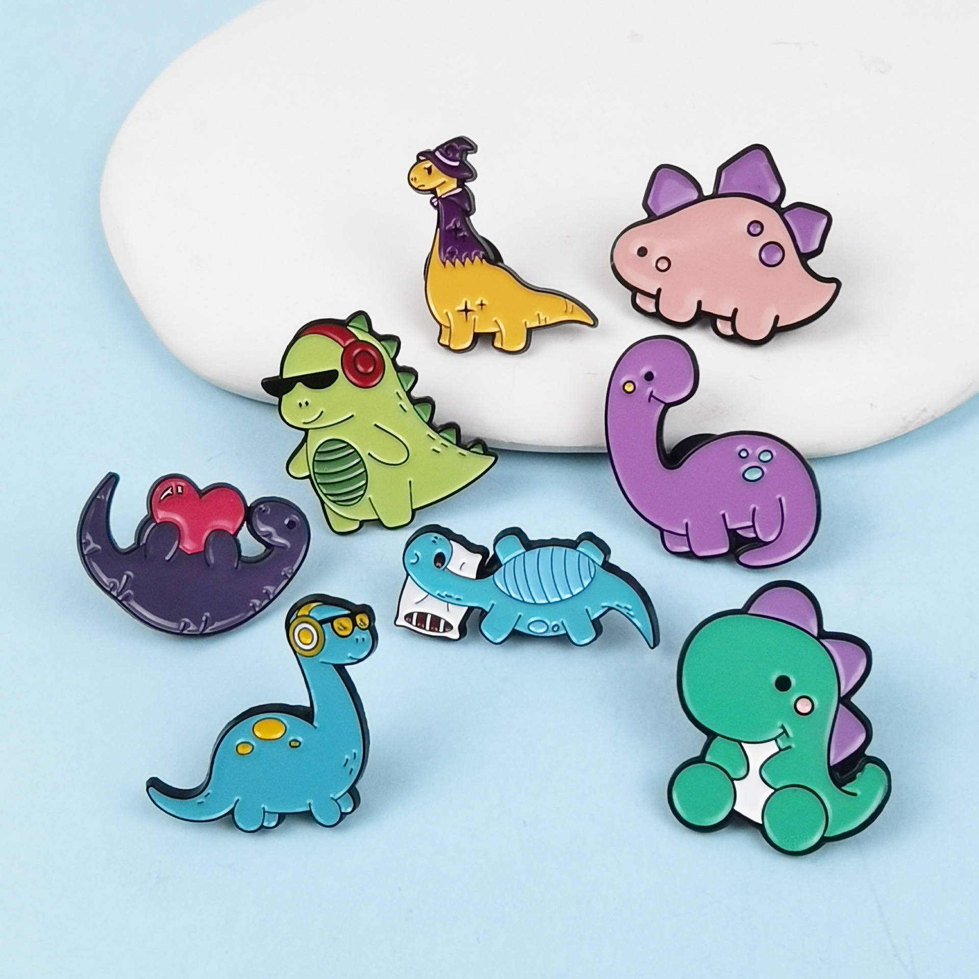 Lindo y lindo broche de dinosaurio pequeño, personalidad, estilo de dibujos animados, accesorios de mochila, accesorios de insignia de aleación de aceite de goteo de alfiler