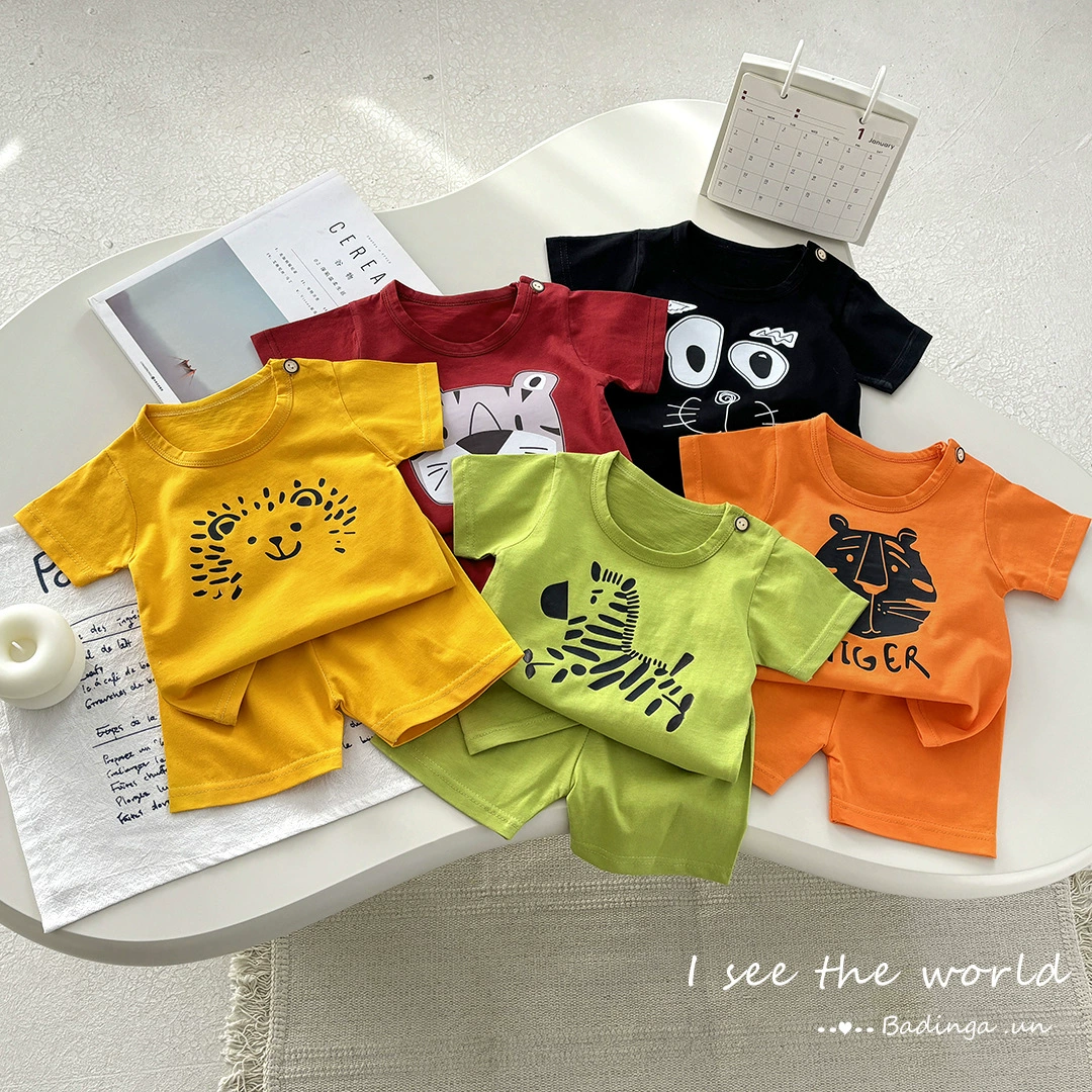 2025 новый детский хлопковый набор с короткими рукавами летняя мужская и женская мультфильм сплошной цвет повседневный тонкий набор из двух частей