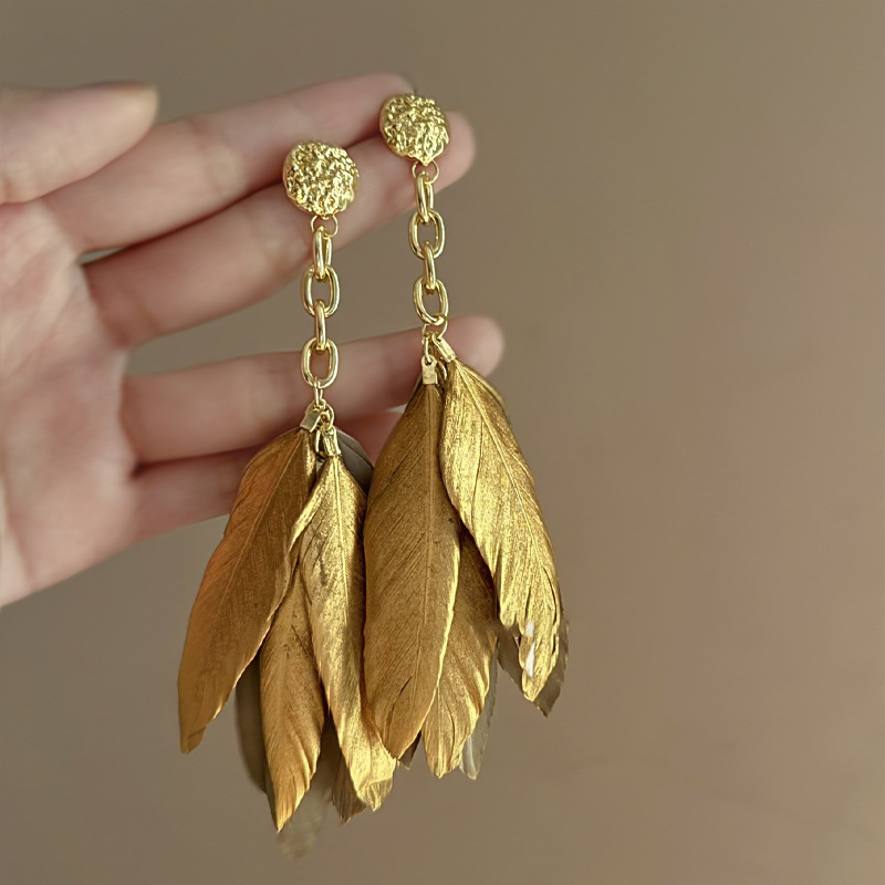 Boucles d'oreilles à pompon en plumes dorées et argentées, boucles d'oreilles rétro de niche française, boucles d'oreilles de style ethnique exotique, nouvelles boucles d'oreilles de style chinois_voghion.com
