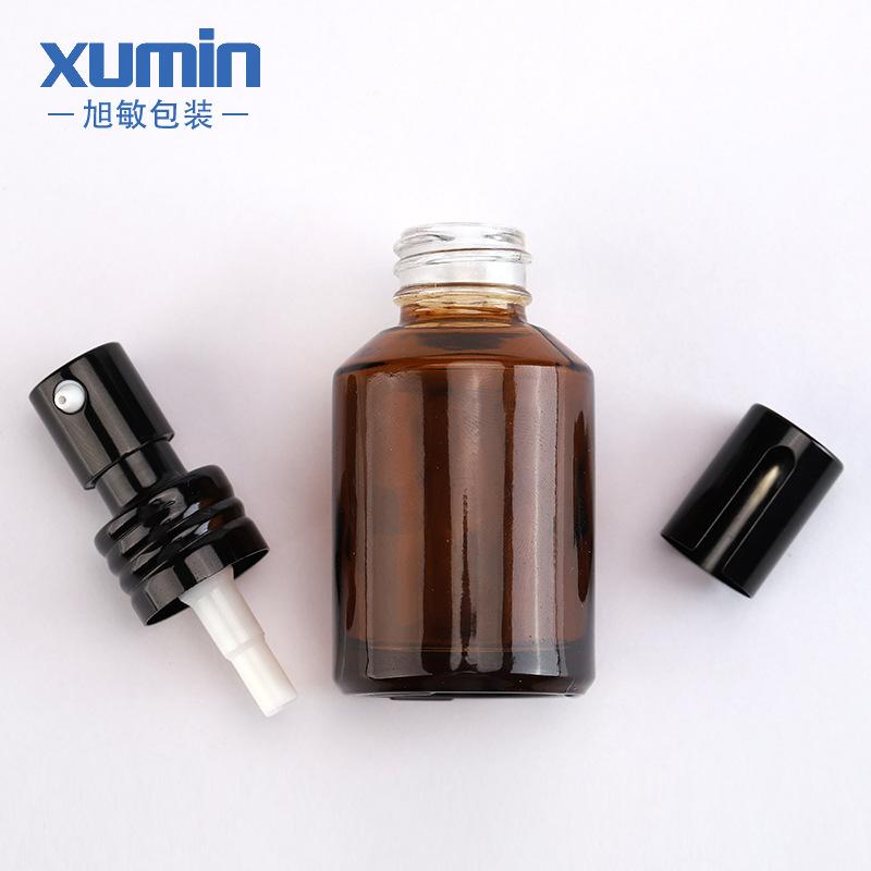 Xumin embalaje 30ml marrón botella de loción de pequeña capacidad botella de líquido de esencia de vidrio verde botella de bomba de presión de sub-embalaje