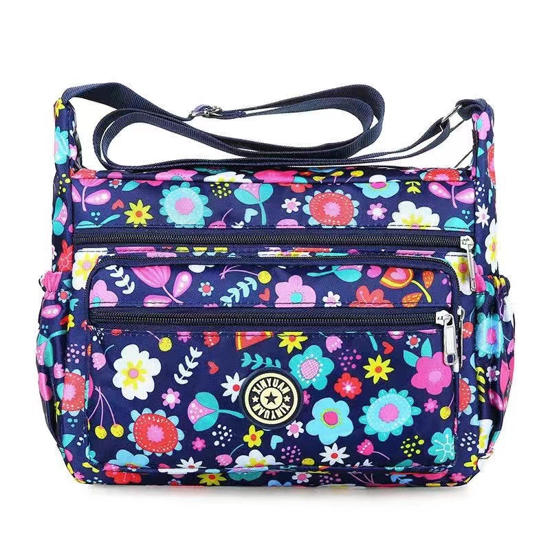 Bolsa de tela de flores bolsa de mensajero de las mujeres nueva bolsa de Madre de gran capacidad bolsa de hombro individual de mediana edad y ancianos bolsa de tela Oxford bolsa