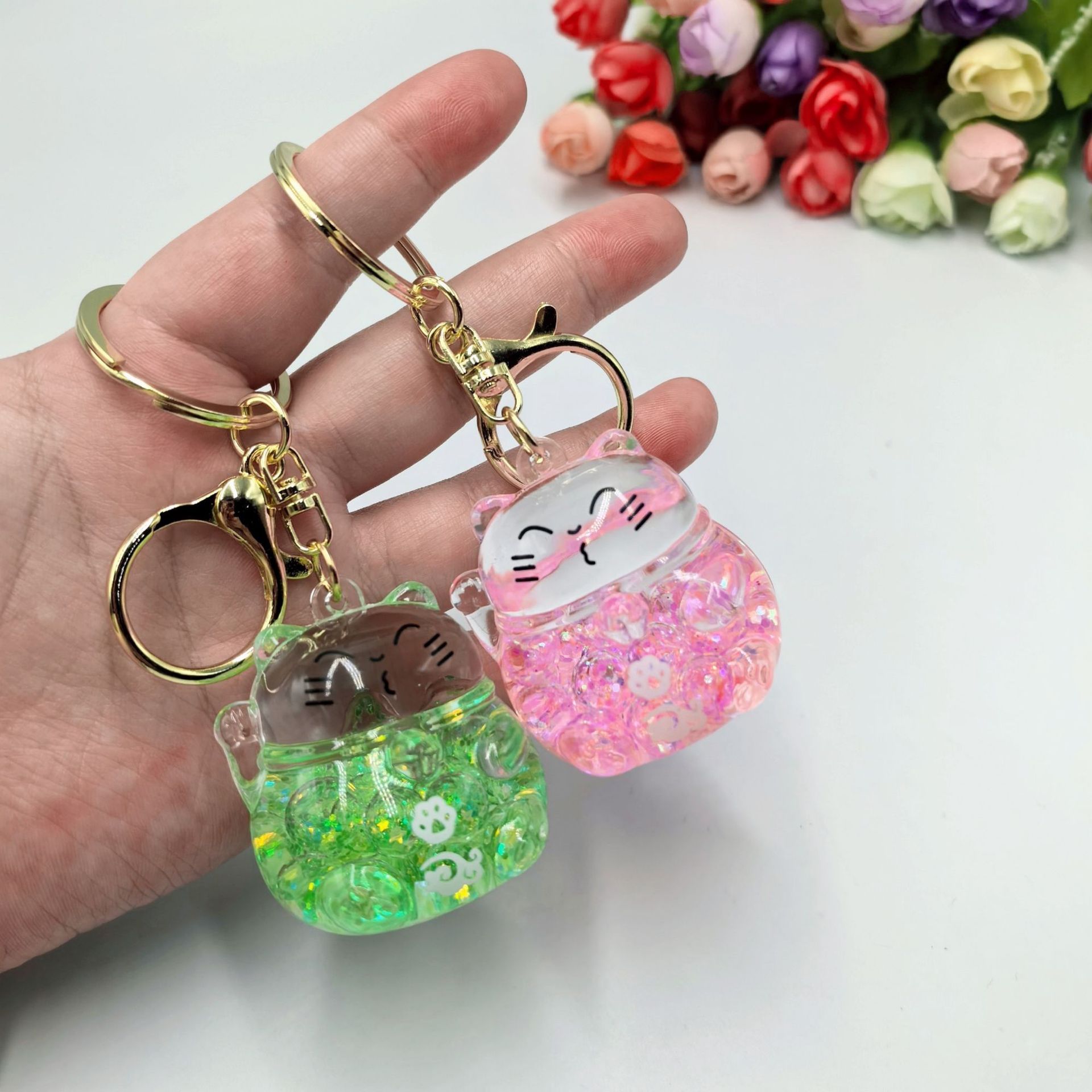 Nocturnal burbuja perlas fluyen arena en aceite para atraer riqueza gatos llavero colgante bolsos de moda boutique colgante regalo creativo