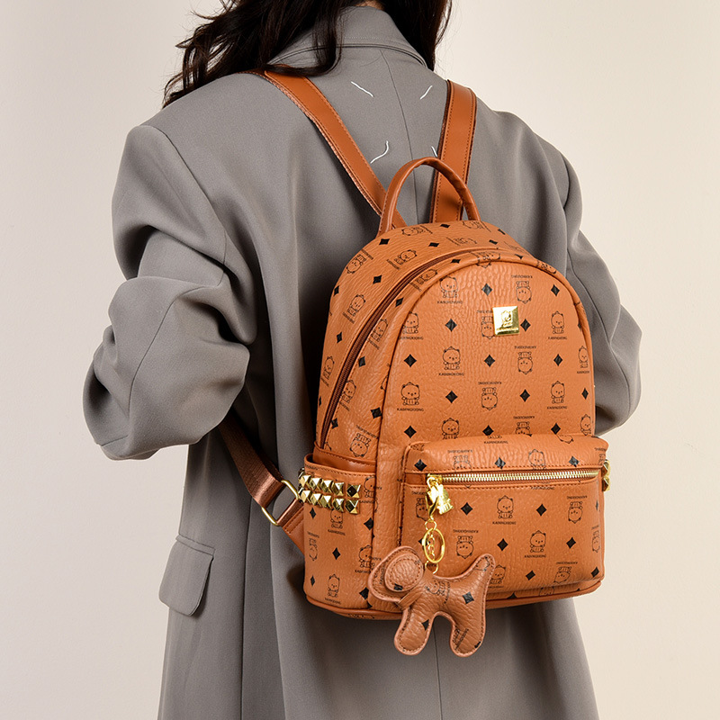 Europa y América retro popular mochila de mujer caricatura lindo oso mochila de estudiantes universitarios 2025 nueva mochila impresa