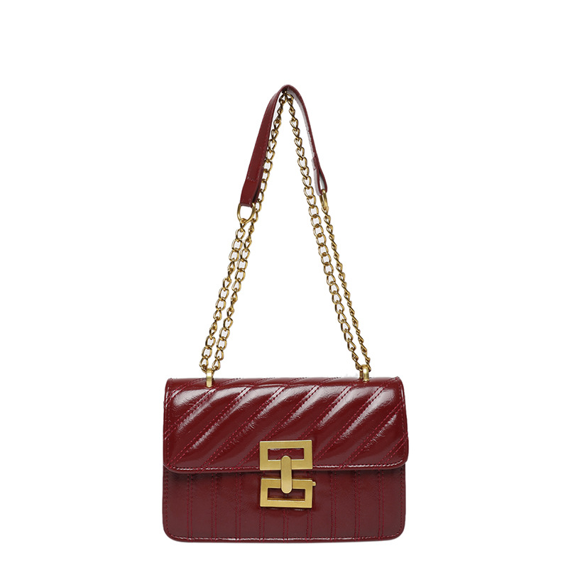 Bolso de hombro recubierto bordado retro 2025 nueva moda de color sólido popular cadena casual de moda bolso de mochila