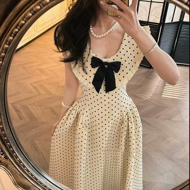 Красивое плиссированное длинное платье с бантом и темпераментом в горошек для похудения во французском корейском стиле с нишей на талии