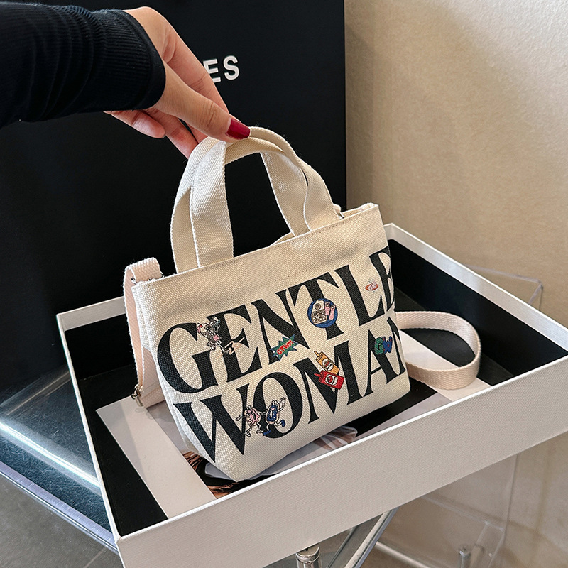 Mini Portable Small Bag Women's New Style Thai Instagram Popular Mobile Phone Bag Fashionable Canvas Distinctive Crossbody Shoulder Bag Mini Portable Small Bag Women's New Style Thai Instagram Popular Mobile Phone Bag Fashionable Canvas Distinctive Crossbody Shoulder Bag