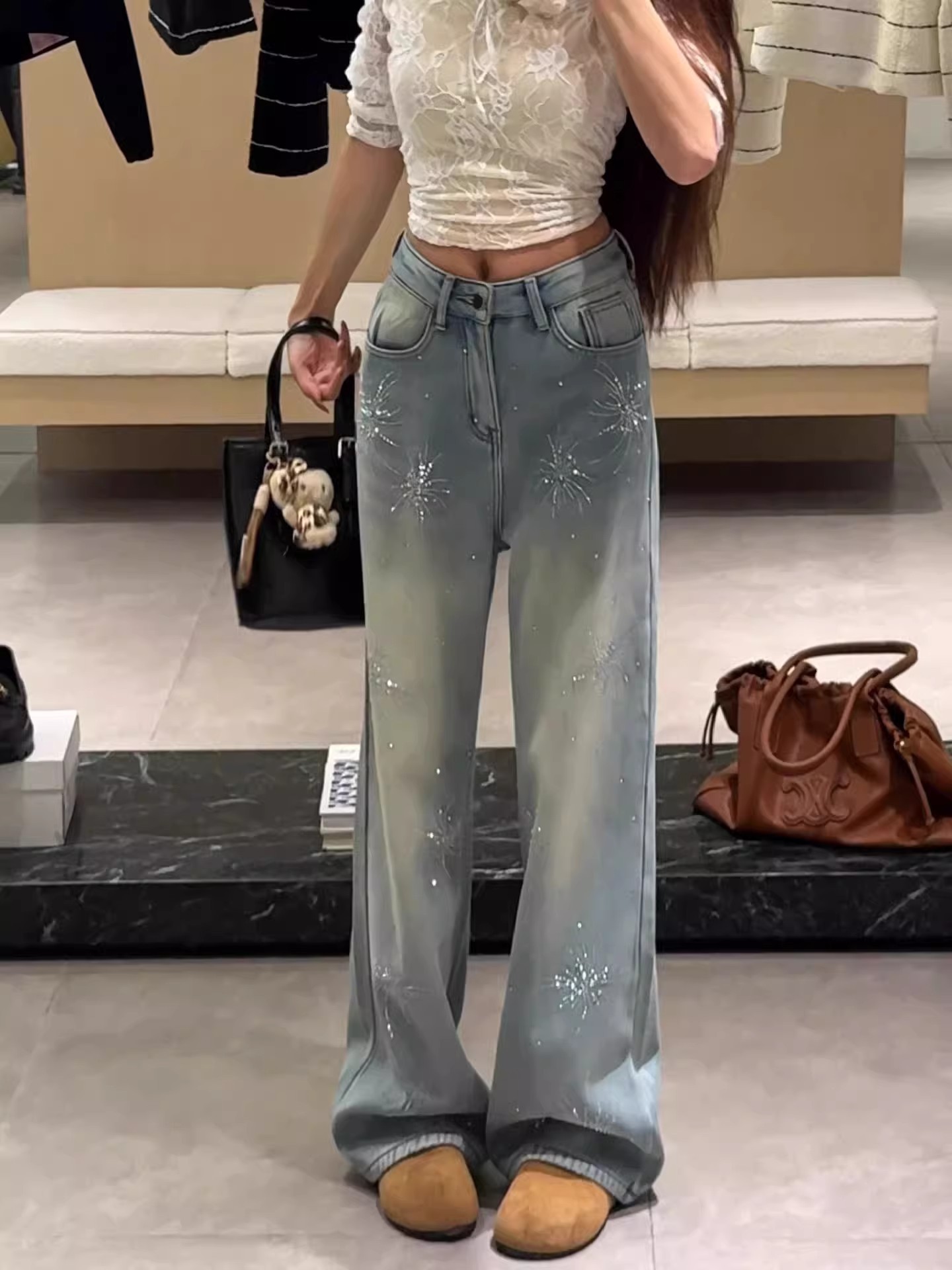 Women's Light Blue Flared Jeans With Firework Rhinestone Details_voghion.com