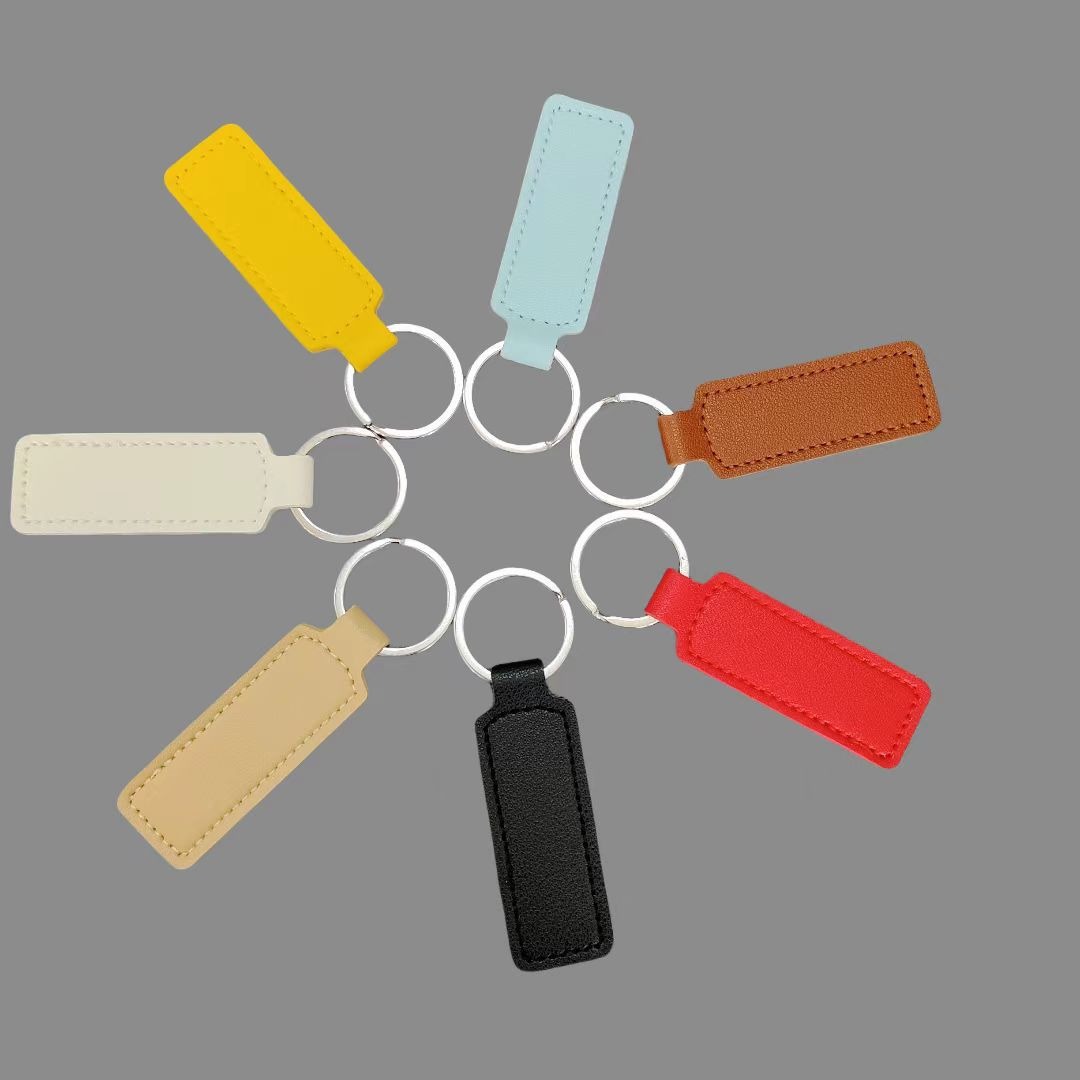 Fabricante spot versión coreana de llavero de cuero PU llavero de coche simple colgante llavero creativo llavero de cuero