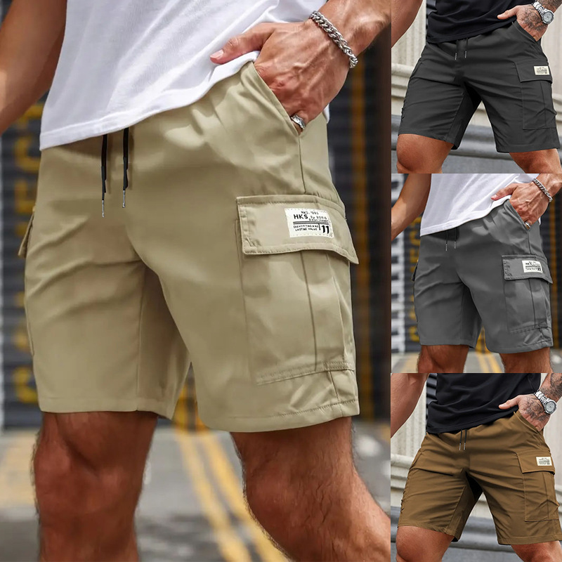 Pantalones cortos de trabajo de verano transfronterizos para hombres sueltos, secado rápido, pantalones casuales de cinco centavos de tamaño europeo, pantalones de bolsillo recto resistentes al desgaste