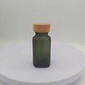 特惠60ml方玻璃瓶透明墨绿色酒水乳剂分装瓶塑料金属竹木盖现货