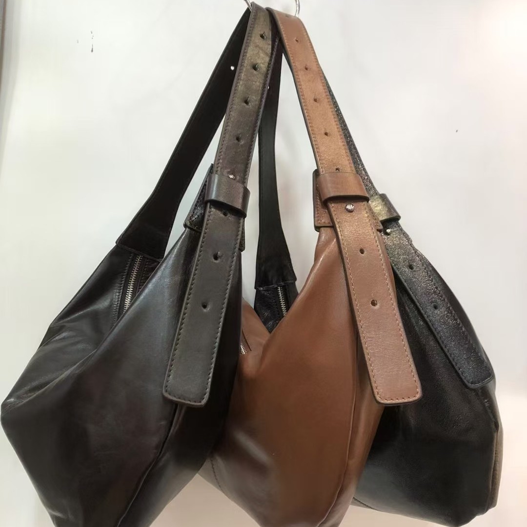 Bolsos de albóndigas de piel blanda de gran capacidad nuevos bolsos de ocio simples para mujeres, 100 bolsos de hombro para viajeros, bolsos de axila