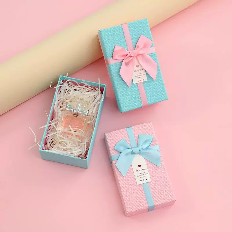 Rectangular lipstick with bow, cosmetic perfume, gift box