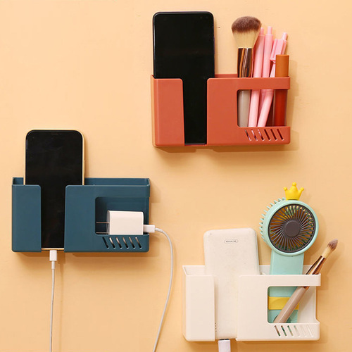 Hole-free mobile phone charging storage box multi-function remote control storage rack bedside storage rack wall hanging bracket
