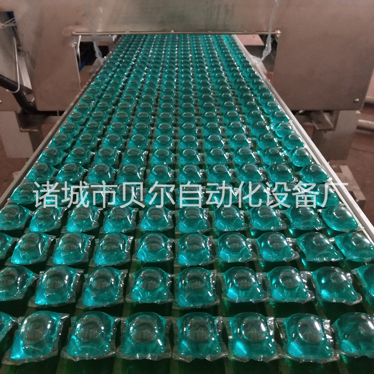 供应香槟色8克洗衣凝珠机器设备，提供洗衣珠原液配方，送货到厂