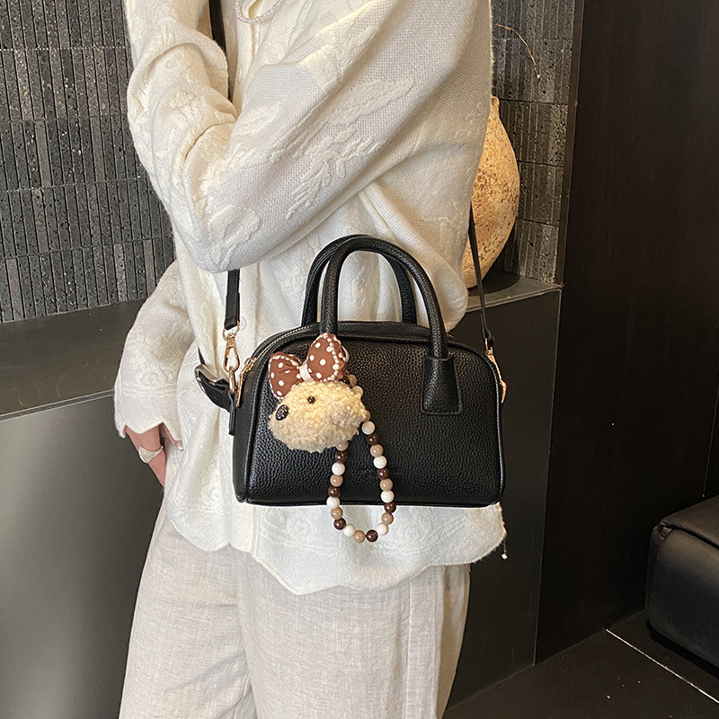 Niche Zhong bolso de almohada portátil para mujeres 2026 nuevo bolso de hombro bolso coreano bolso conchas de litchi