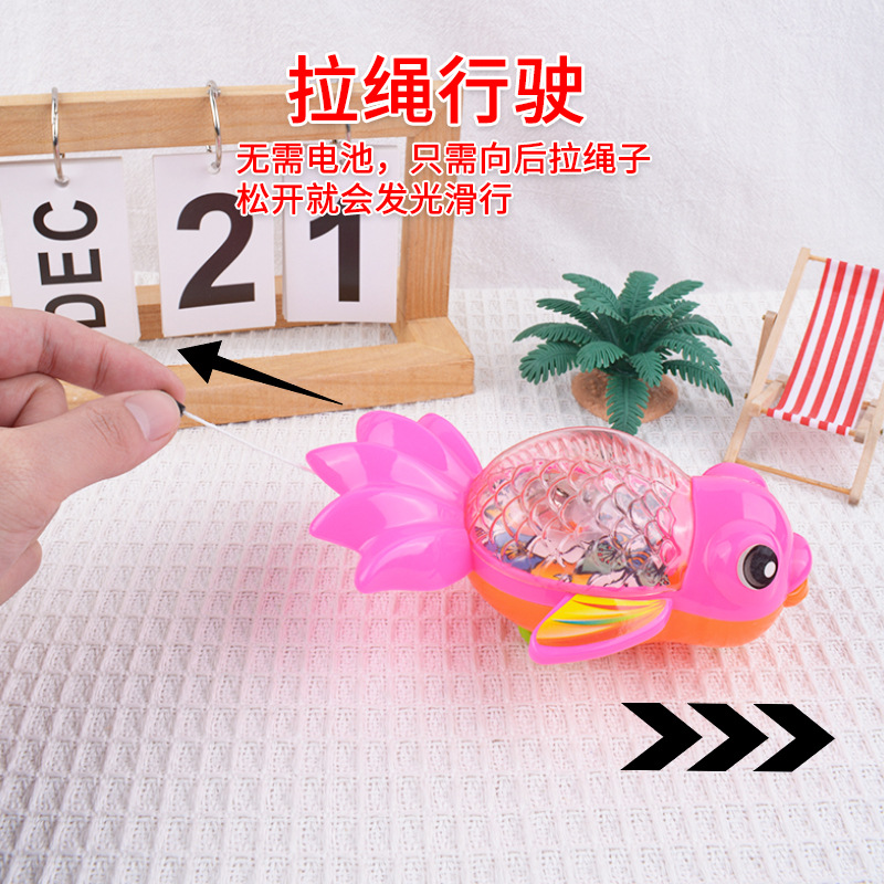 Hilo de tracción para niños Juguetes luminosos, cuerda de tracción, se ejecutará, peces de colores brillantes, animales de dibujos animados, niños y niñas, regalos al por mayor