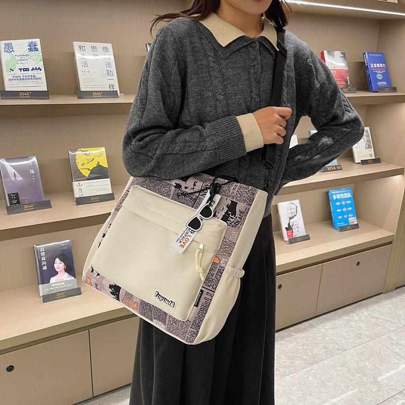 새로운 학생 SCHOOLBAG 대용량 크로스 바디 백 학생 가방 틈새 패션 어깨 가방 남성 캐주얼 가방