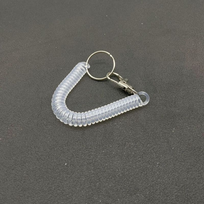 キャンディー色の高弾プラスチックは電話線のスプリングロープのキーチェーンをなくして携帯電話のカードカバーストラップのキーチェーンを包みます。|undefined