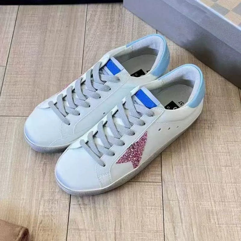 Versión mejorada de Corea del Sur GG Star Zapatos sucios de cola negra Zapatos sucios pequeños Zapatos de tabla viejos de cola plateada para mujer Zapatos casuales de aumento para hombres