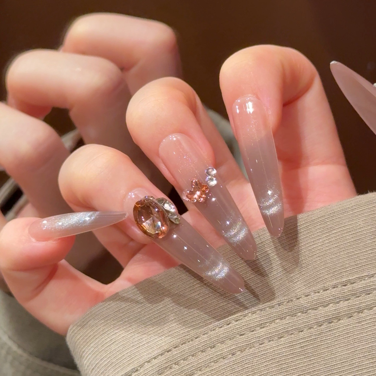 2026 otoño y invierno nuevo uso de uñas sonrisas ojo de gato manuales parches de uñas de uñas productos terminados delgados perros largos 4.0